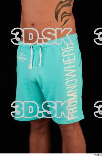 Leg turquoise shorts brown shoes of Leland 0002